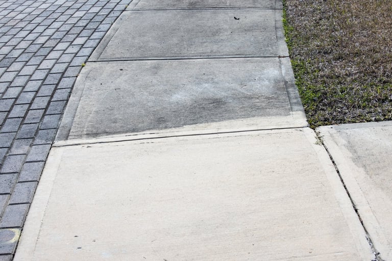 Professional pressure washing and cleaning of concrete surface
